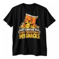 Black t-shirt with a smiling orange crisp packet hugging crisps above the text Not Ignoring You, Just Prioritising My Snacks in cream, orange and yellow