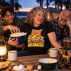 Family at a campsite table, mum wearing the Crisp Packet design black t-shirt