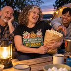 Family at a campsite table, mum wearing the Retro Snack Label design black t-shirt