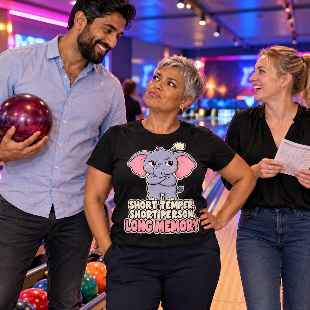 Colleagues at a bowling alley, woman wearing the Cute Elephant design black t-shirt