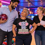 Colleagues at a bowling alley, woman wearing the Cute Elephant design black t-shirt