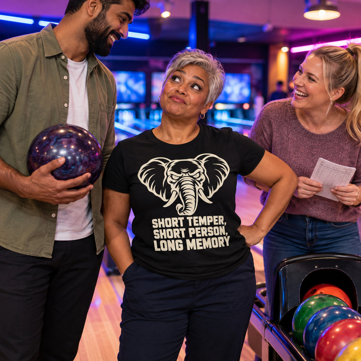 Colleagues at a bowling alley, woman wearing the Minimal Line design black t-shirt
