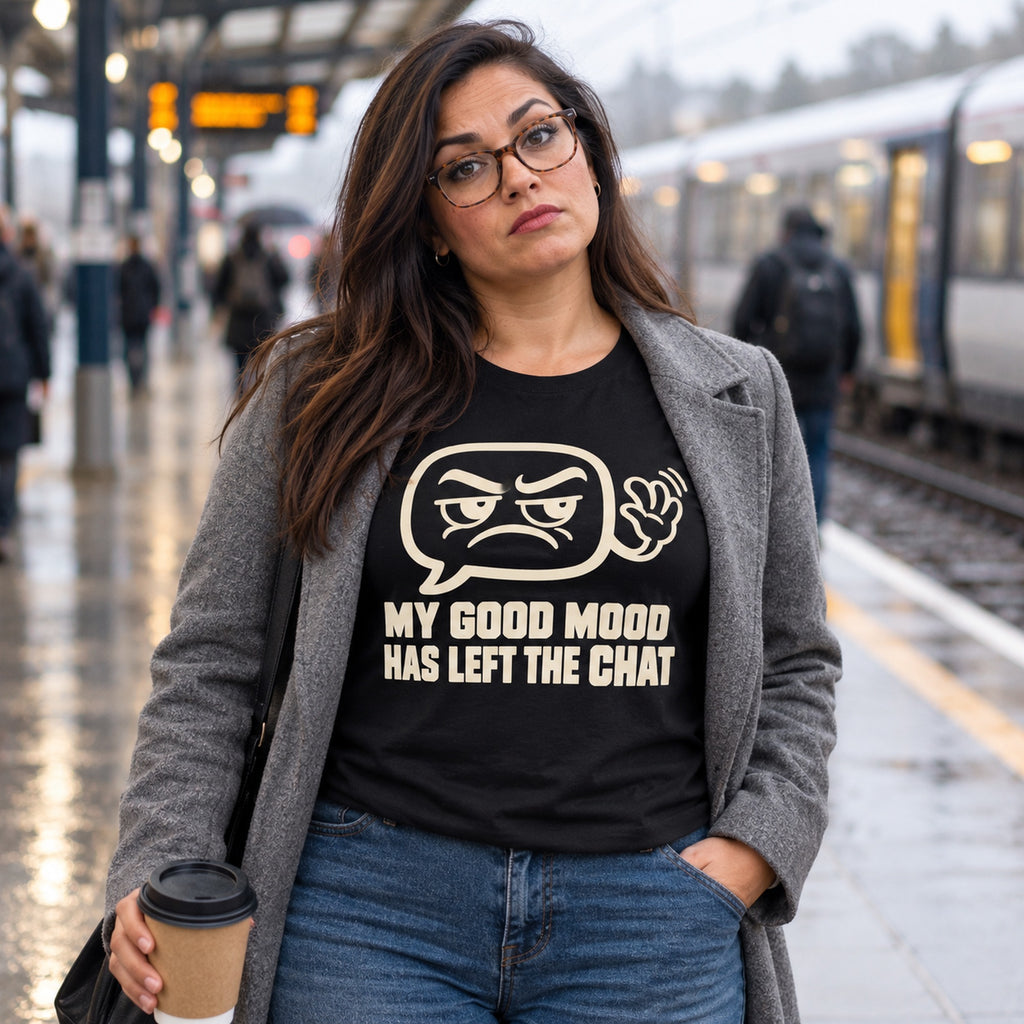 Woman wearing the Minimal Line design black t-shirt on a rainy railway platform