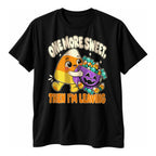Black t-shirt with a happy yellow orange and cream striped character hugging a purple trick or treat pail above the text One More Sweet Then I'm Leaving