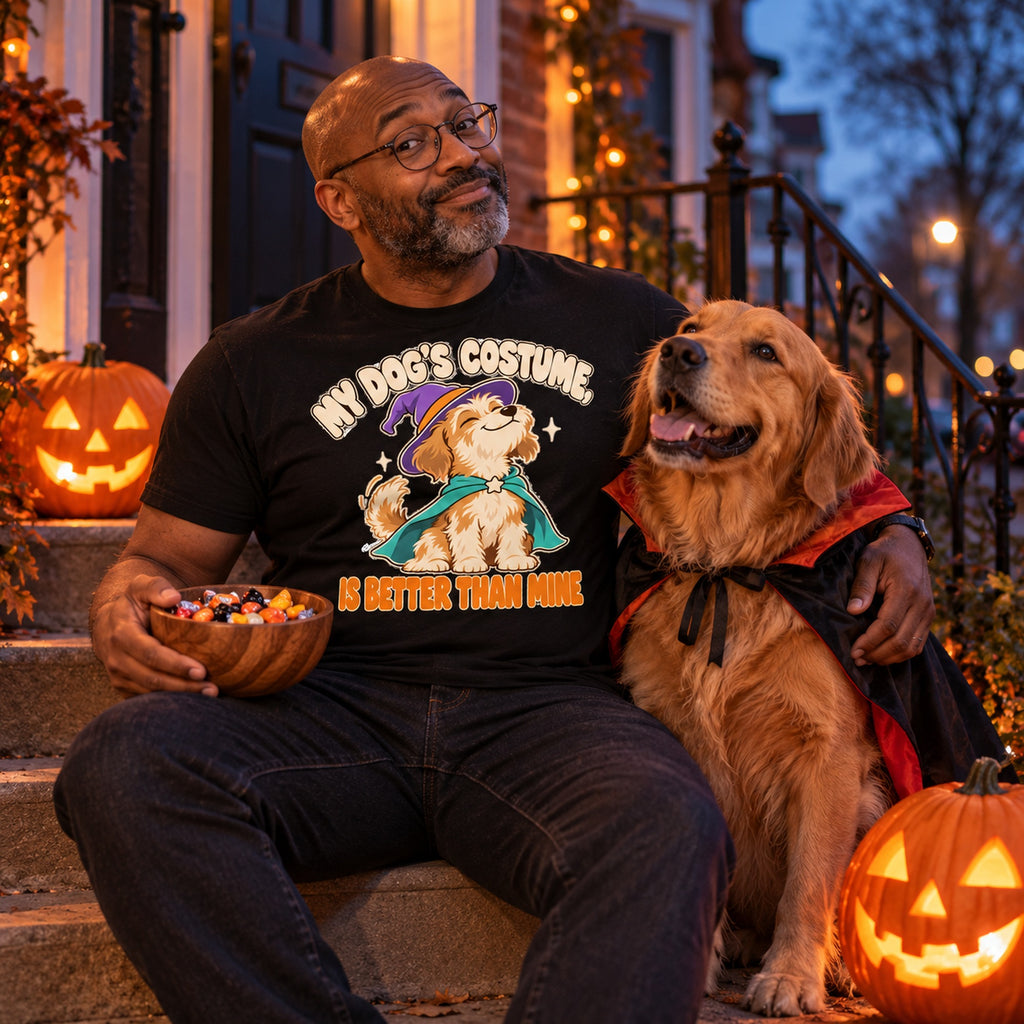 Man wearing the Smug Witch Dog design black t-shirt on a porch on Halloween evening with his golden retriever in a vampire cape