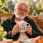 White mug with a teapot, cup, sugar cubes and terracotta and charcoal lettering reading Brew First, People Second, lifestyle photo 1