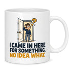 White mug with an open door, a puzzled cartoon man in pyjamas, a mustard question mark and navy lettering reading I Came In Here For Something. No Idea What.